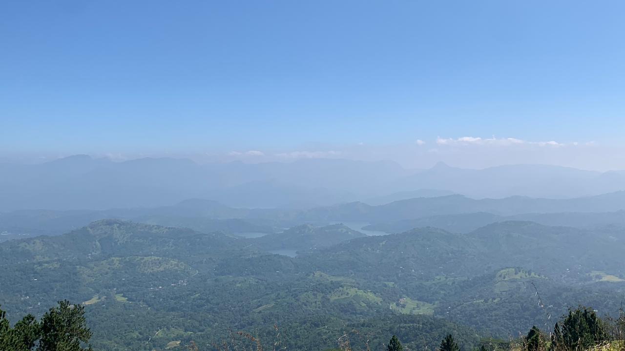 Tourist enjoying mountain roads in Sri Lanka with a rental 